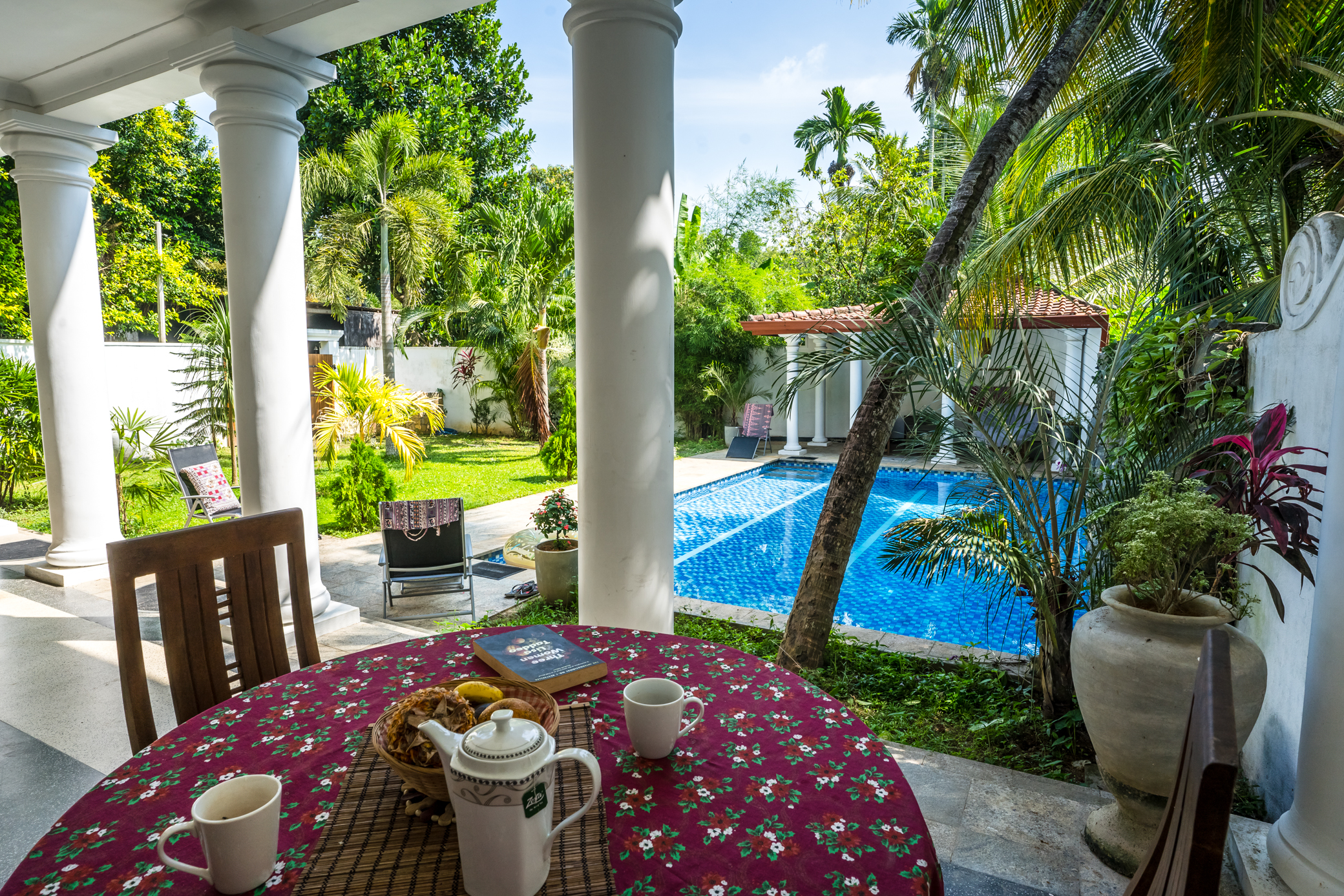 Breakfast table overlooking the pool